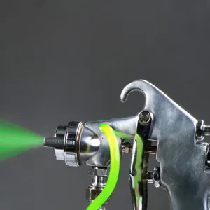 spray gun with neon green liquid